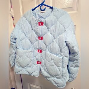 Pale Blue Quilted Coat with Orange Accents
